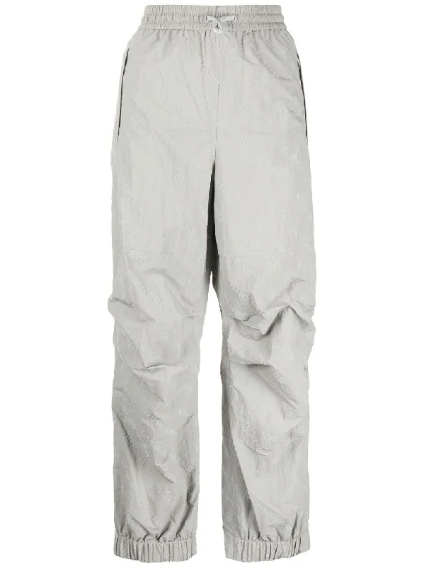 FLOCKED LOGO TRACK PANTS Formal Stretch Pants